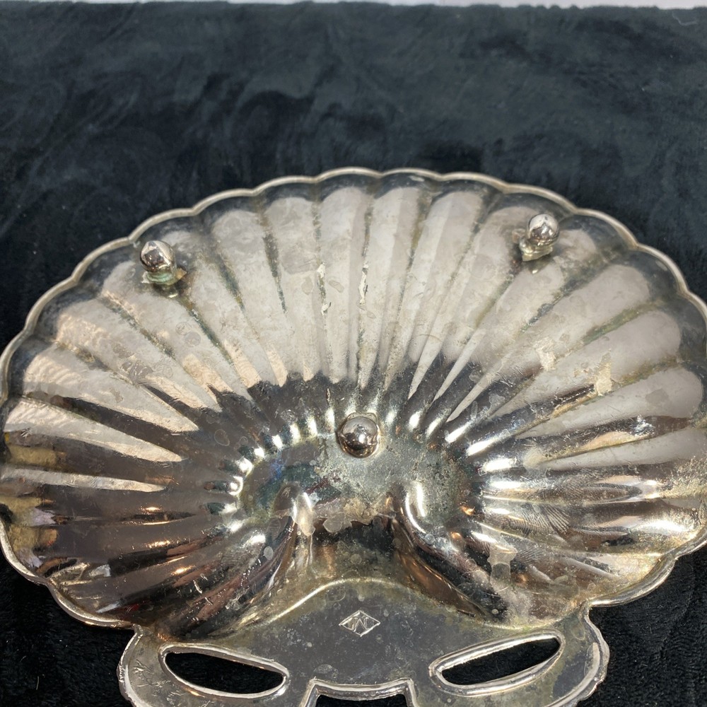 Scallopped edge silver colored dish