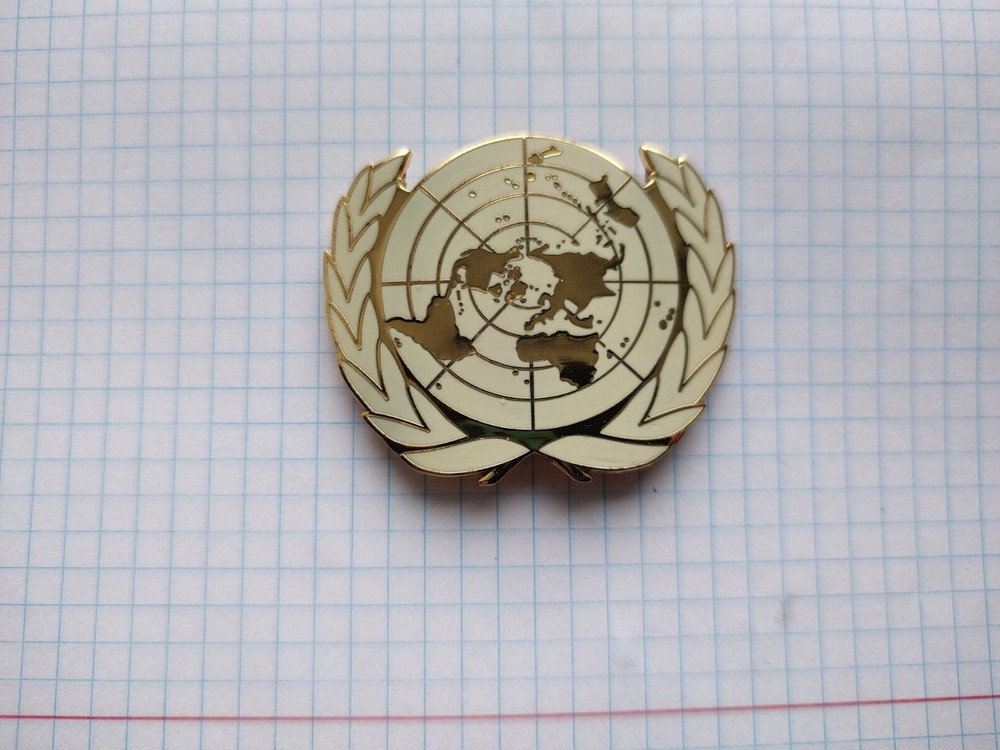 UN inspector badge