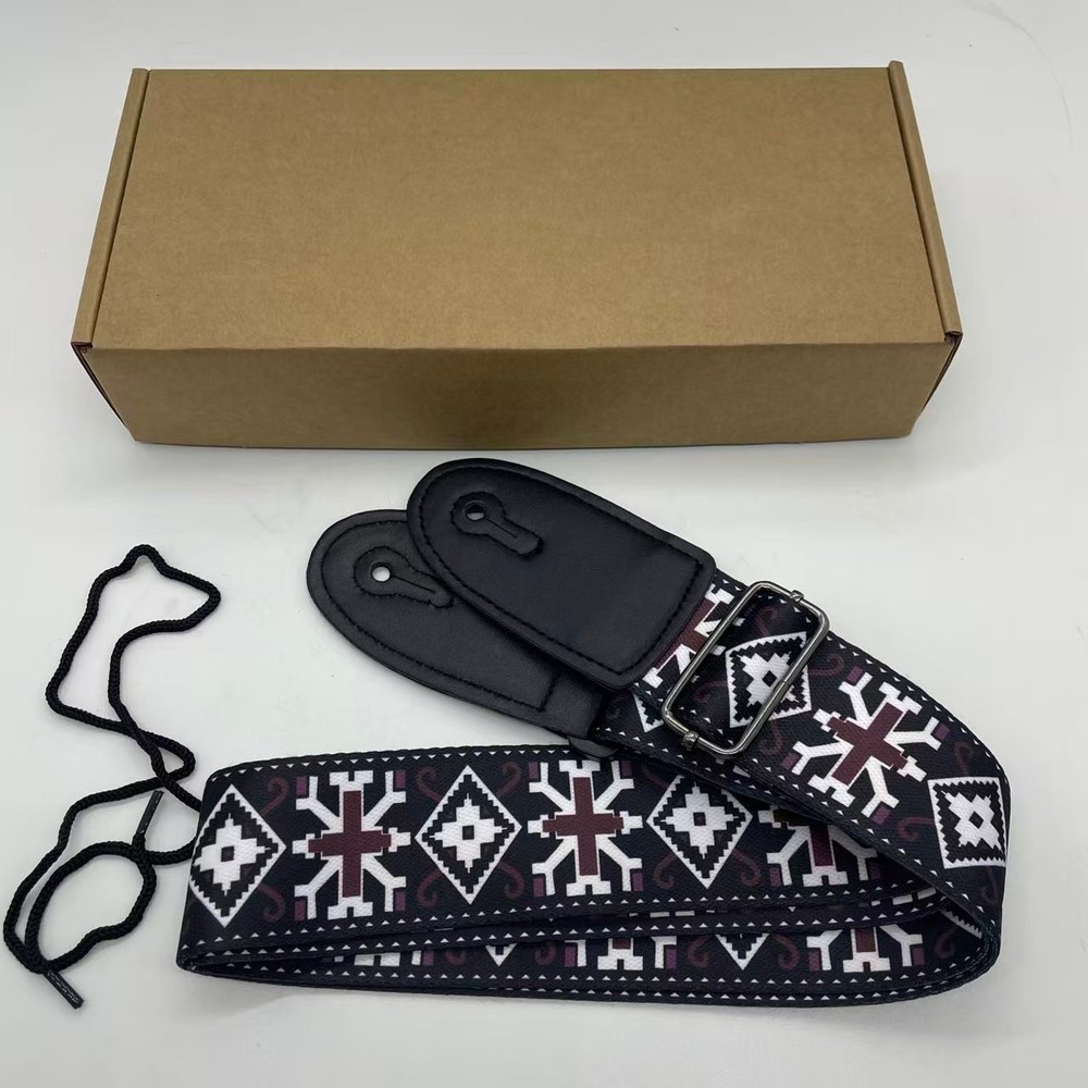 Black checkered pattern guitar strap, highly functional, currently on sale