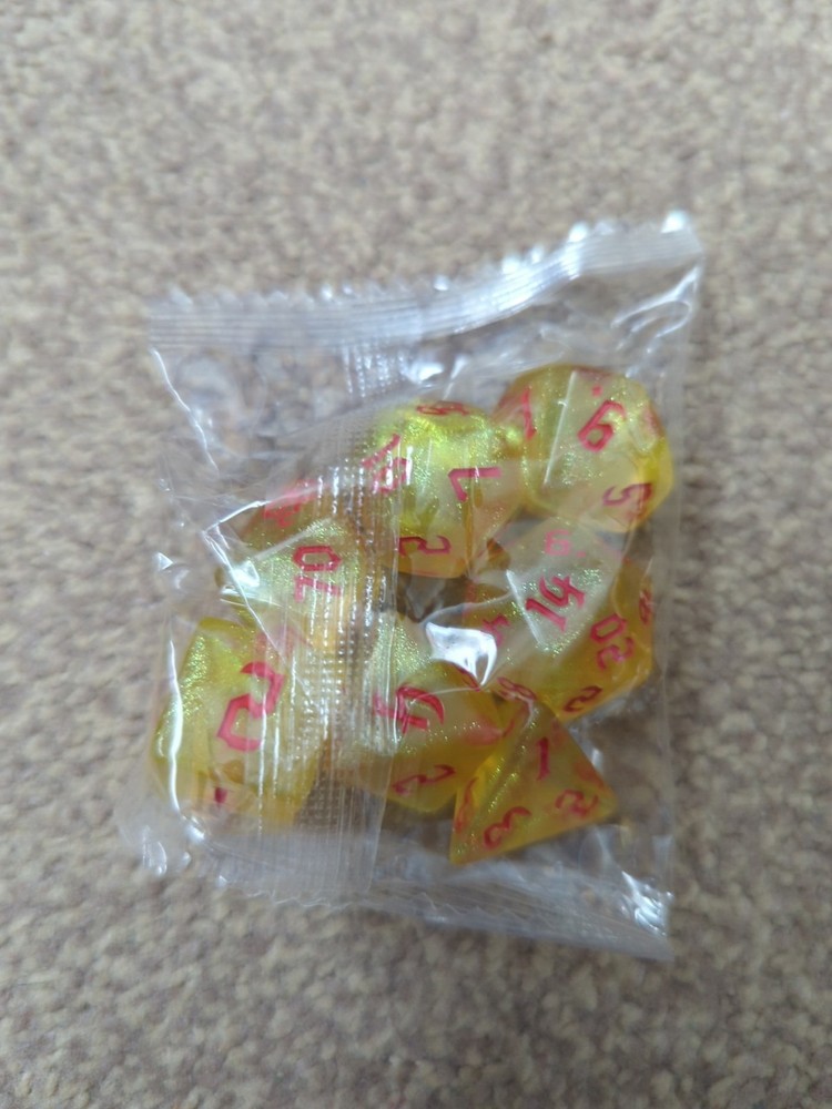Yellow And Red Glitter Dice Set