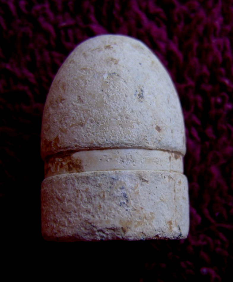 RARE .69 CALIBER FRENCH TRIANGLE CAVITY BULLET WITH TALL BASE (SHILOH)