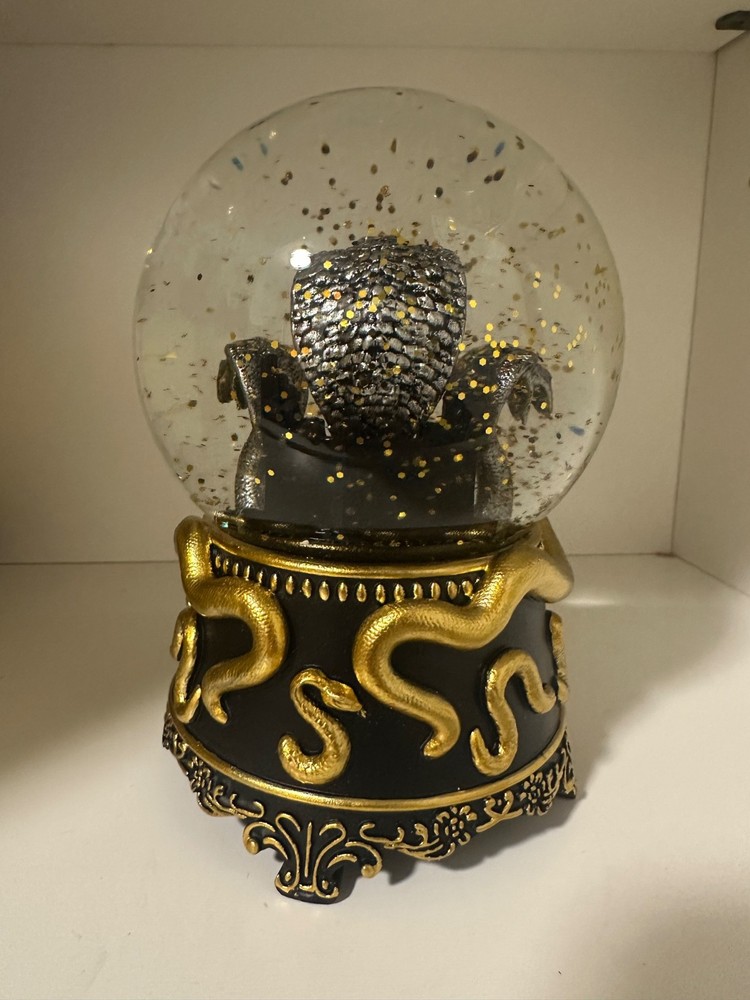 Gold and black snake Snowglobe with white box