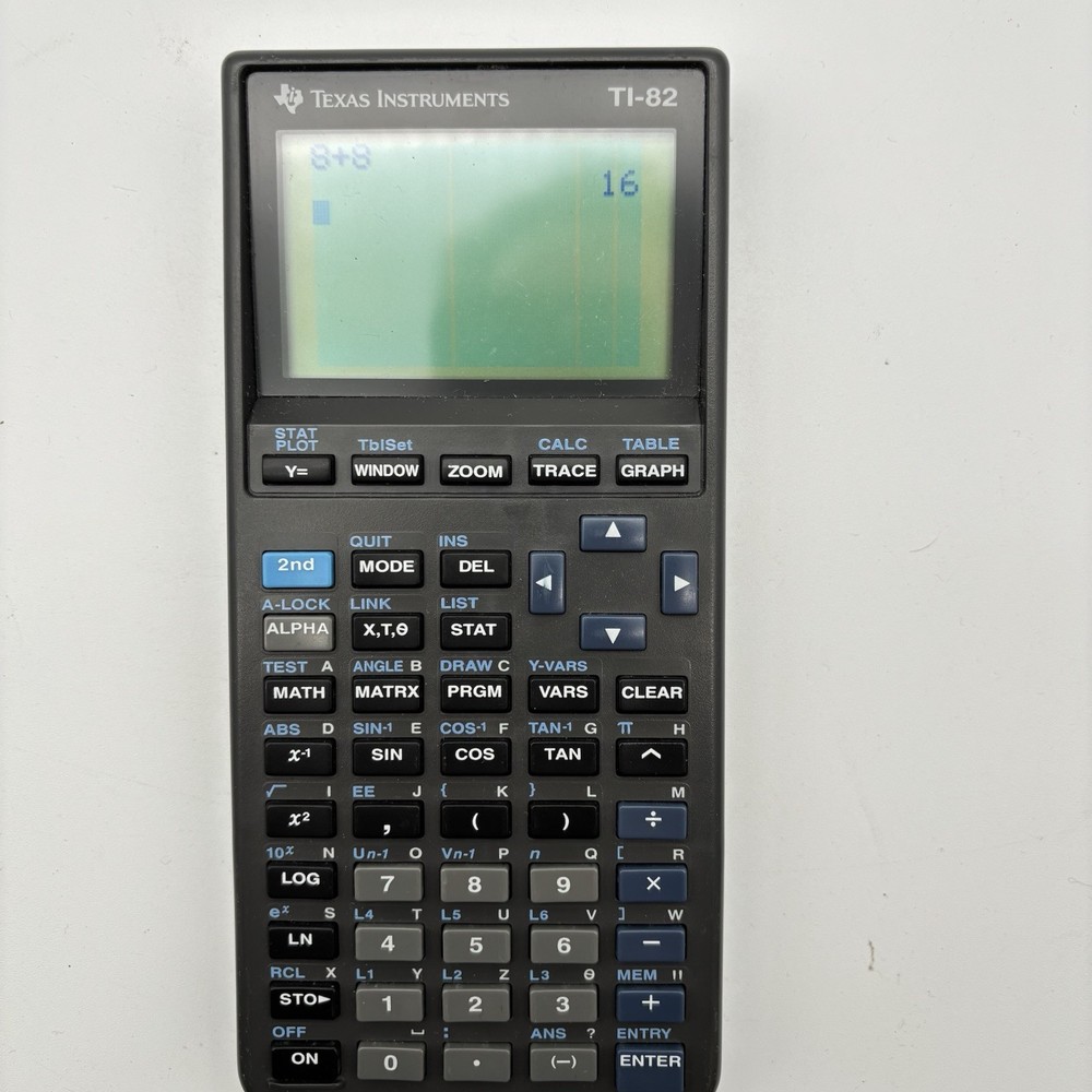 Texas Instruments TI-82 Graphing Calculator Tested  Works.