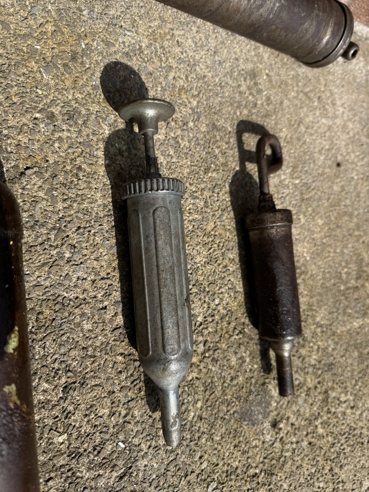Three Vintage Grease Guns