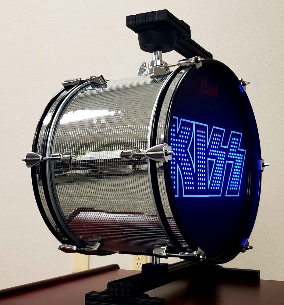 KISS Rotating Drum Display, Double Sided, Internal LED Lighting + Remote Control