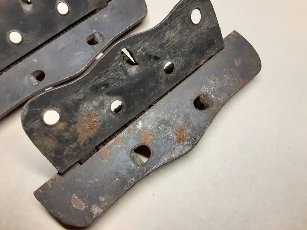 Pair of vintage spring loaded hinges