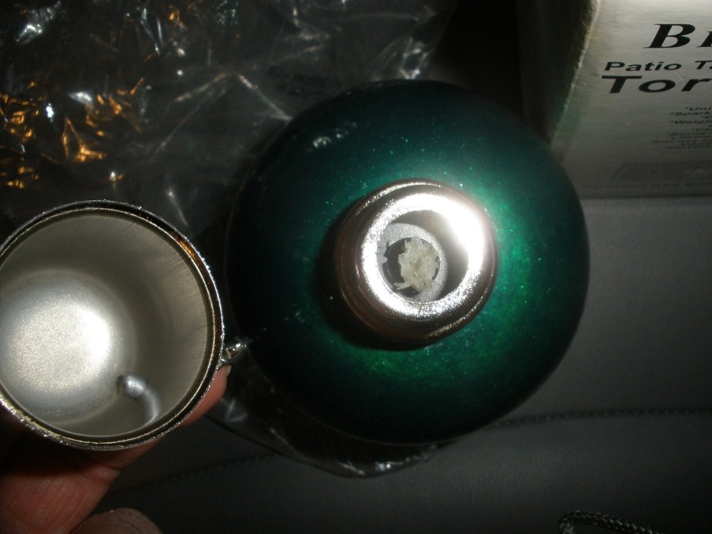 NEW Opened Brookstone Patio Table Torch Green (067)