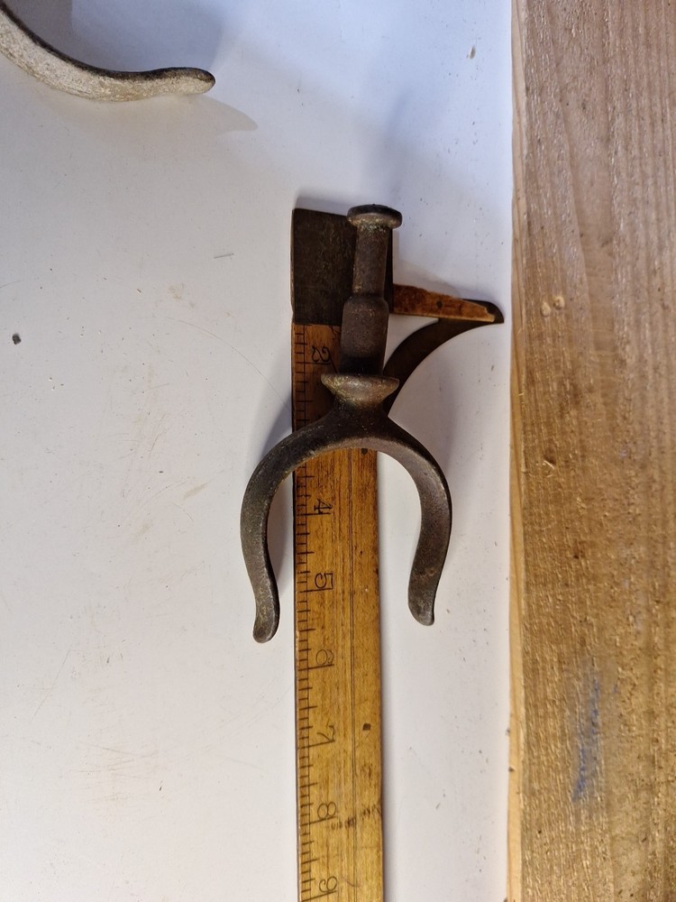 Antique boat oar lock rests