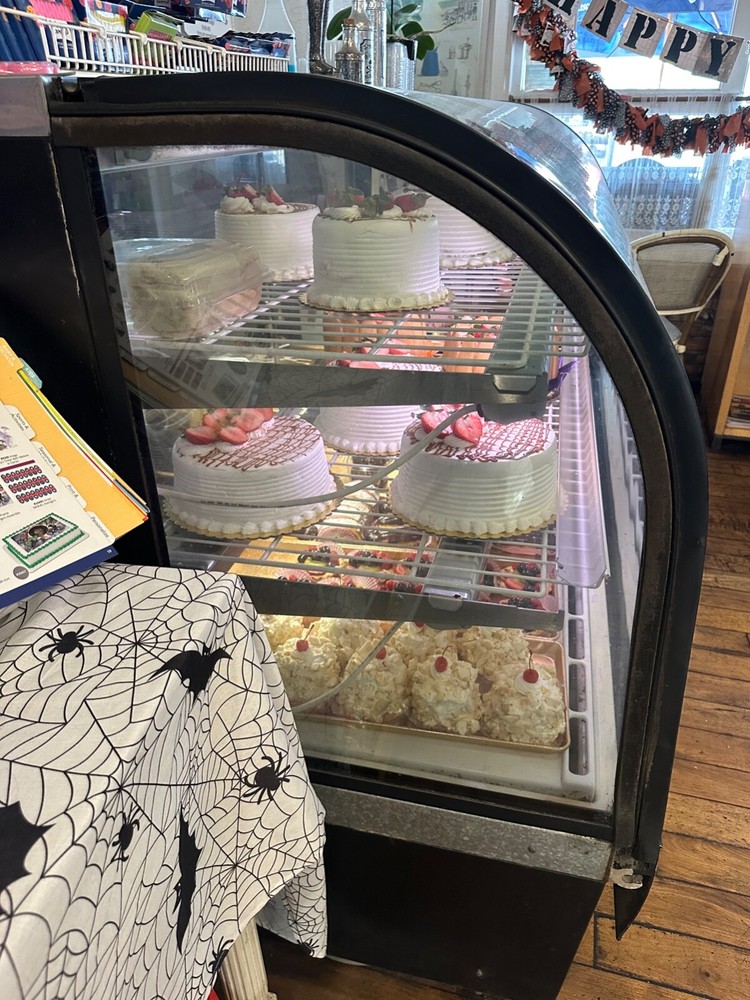 true curved glass display merchandiser