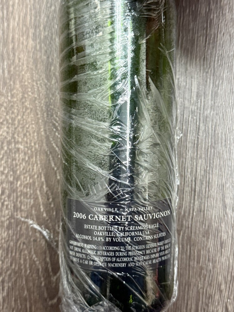 Screaming eagle 2006 and 2014empty wine bottles without cork