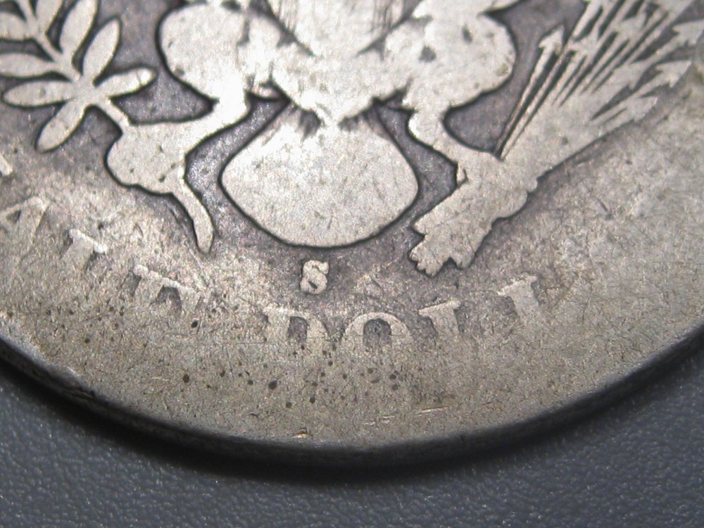 Better-date 1897-s Silver BARBER Half Dollar.