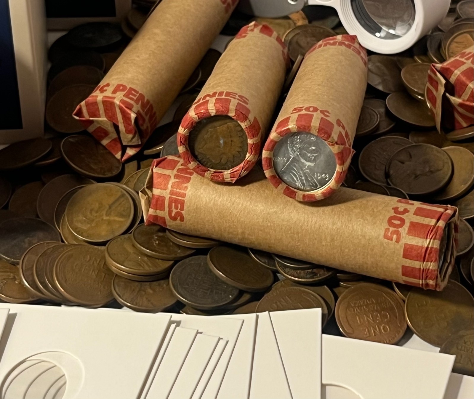 1 roll of UNSEARCHED wheat pennies w/steel cent one end & indian head other end