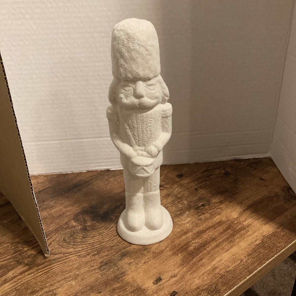 Christmas Ceramic Decor White glitter 10inx2 3/4in nutcracker soldier
