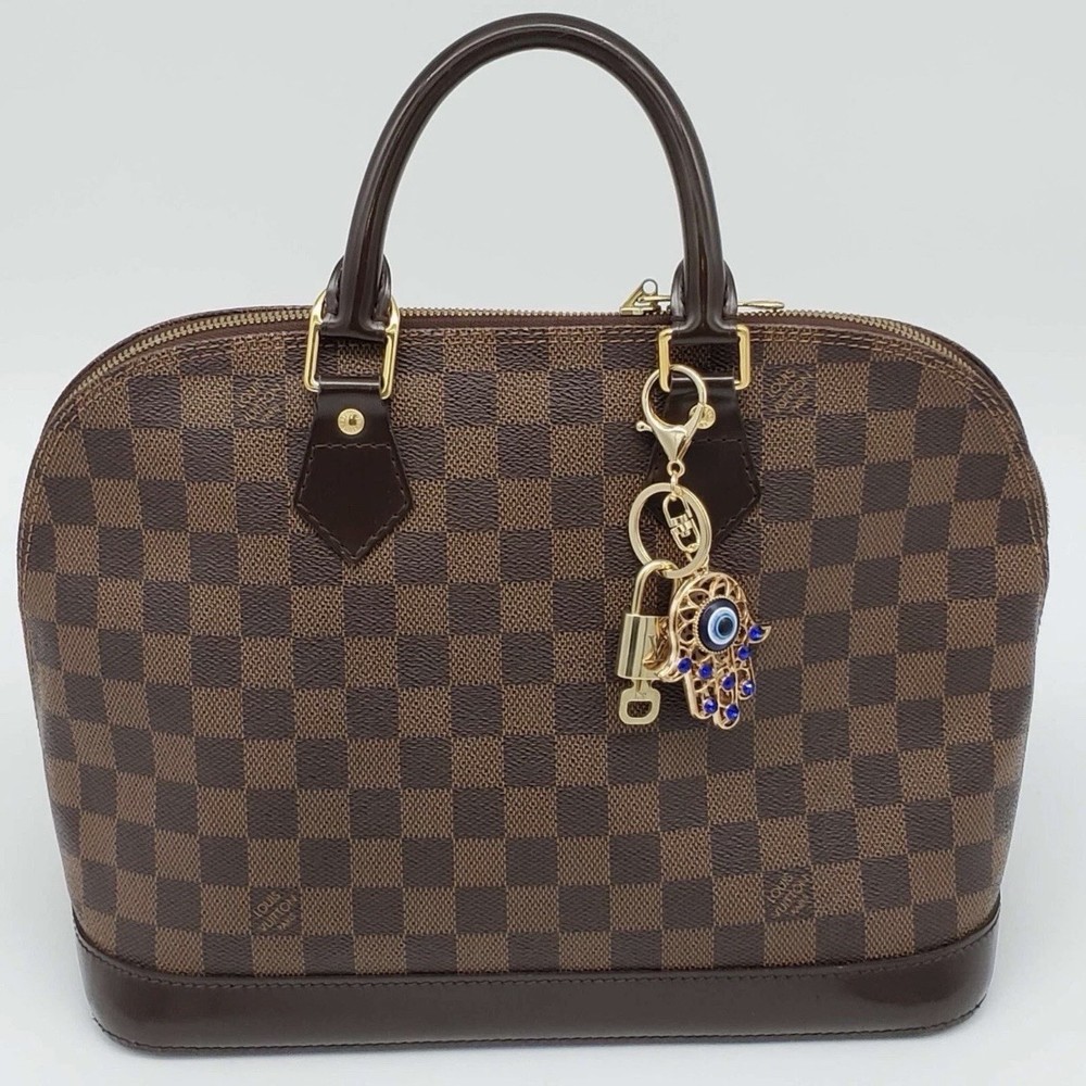 Authentic Louis Vuitton Lock & Key w/ Unbranded Bagcharm, Keychain