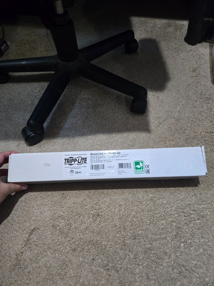 TrippLite Shielded Cat6A Rackmount Feed Through Patch Panel Model N254-024-SH-6A