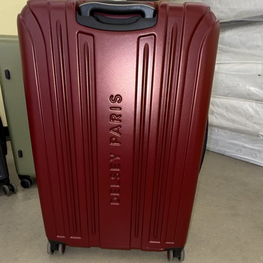 Delsey Paris Red Hardcase Rolling Suitcase Solid Pattern Luggage with Wheels