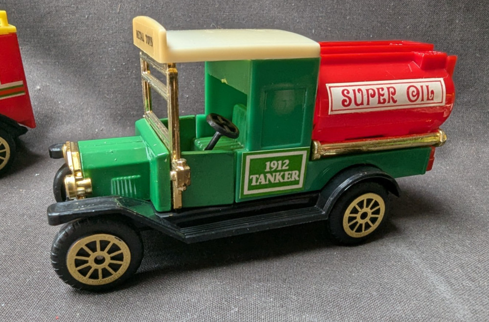 4 Die Cast Vans -