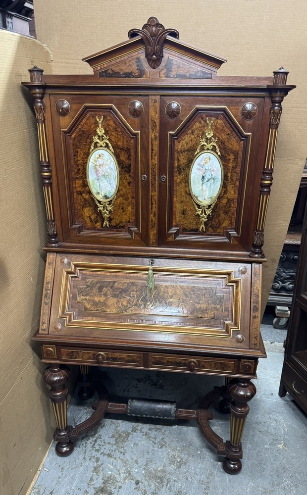 RENAISSANCE WALNUT AND BURLED DROP-FRONT DESK WITH PLAQUES
