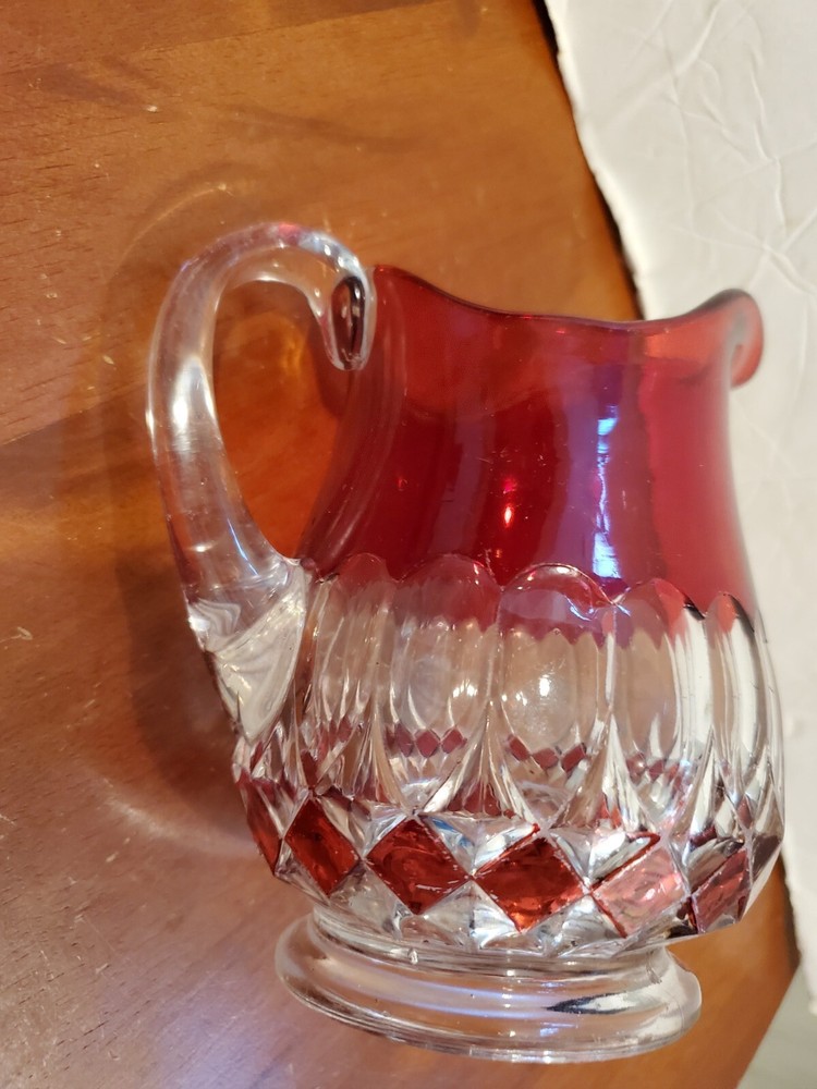Ruby flash to clear small creamer or pitcher, about 5.25" tall x 3.5" diameter