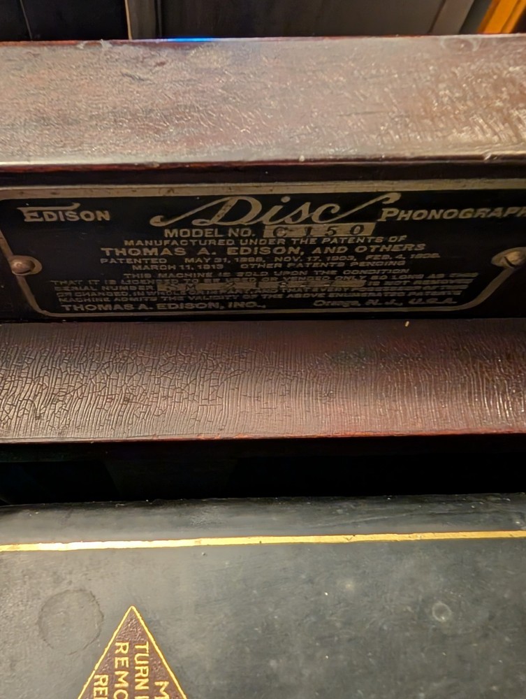 Edison Antique Phonograph Record Player Cabinet.  Includes one record.