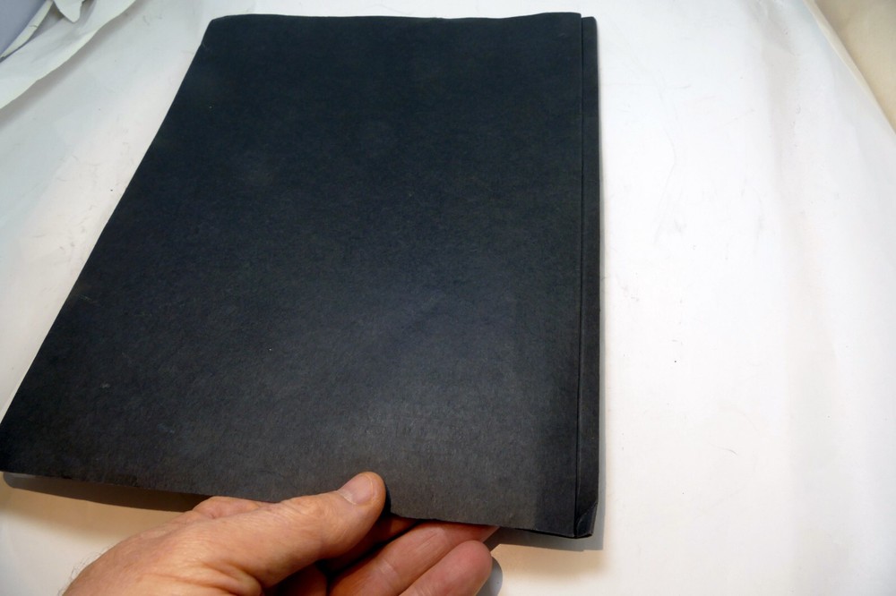 Camera guide instruction manual printed and bound folder for Nikon EM