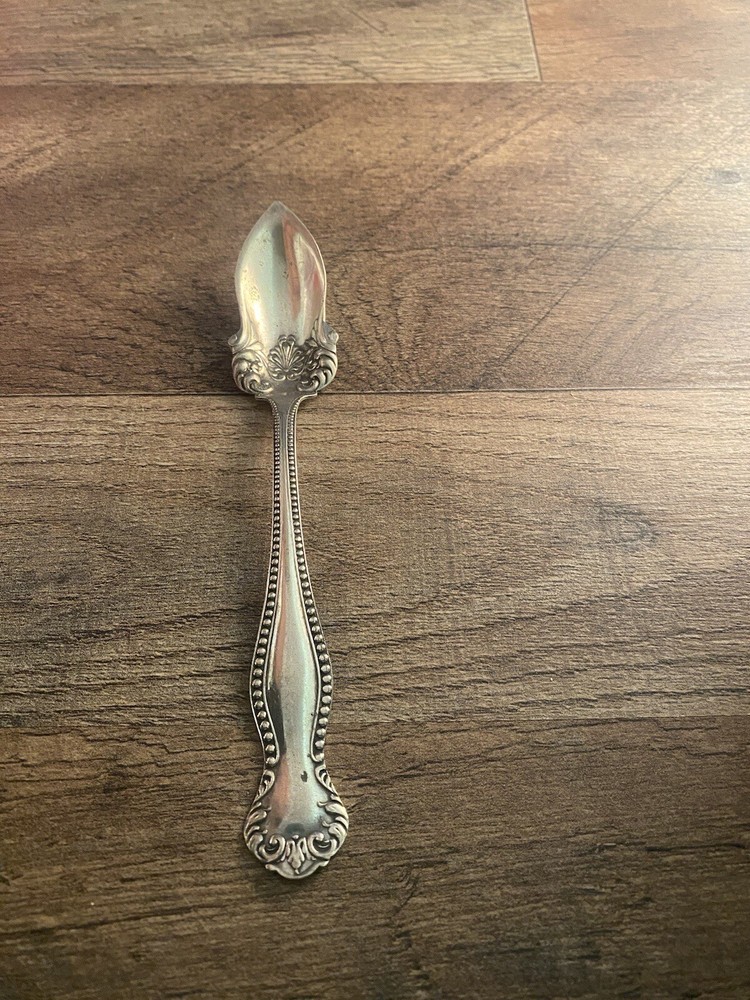 Silverplated Fruit Spoon W in Diamond Unknown Pattern