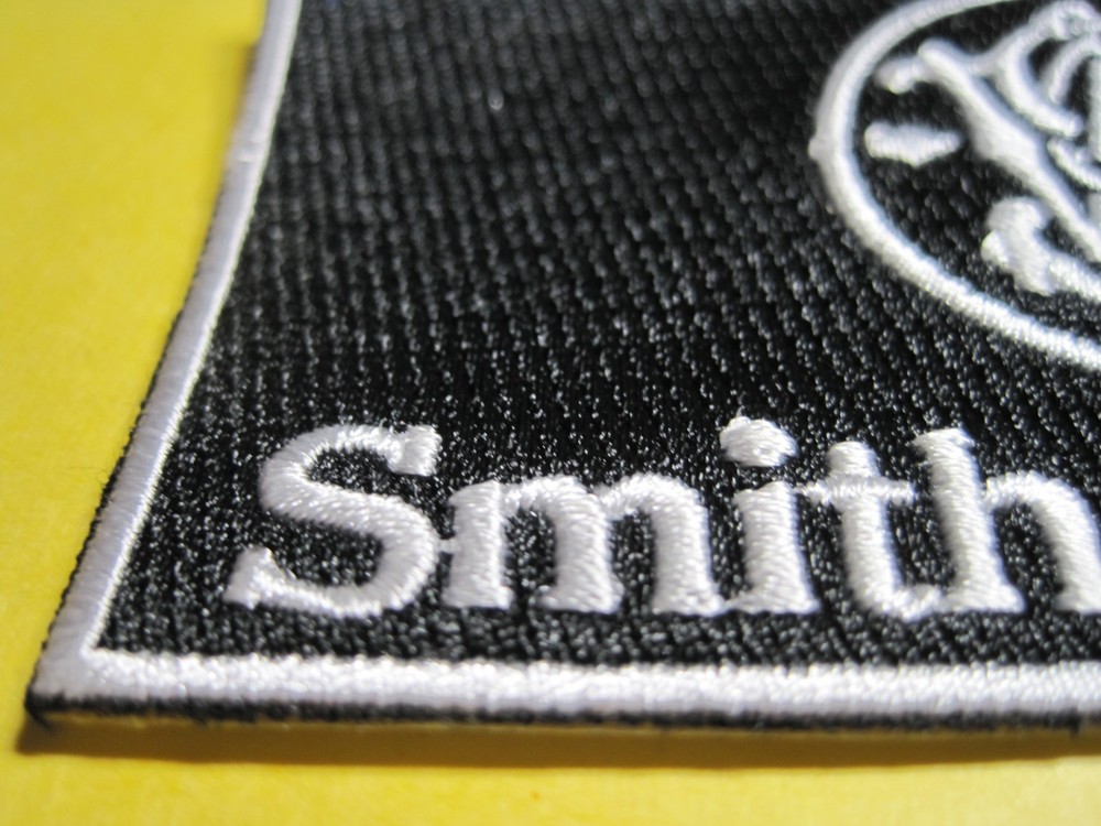 SMITH & WESSON FIREARMS VEST PATCH WITH HOOK BACK! 2 X 4 INCH GUN PATCH BLACK