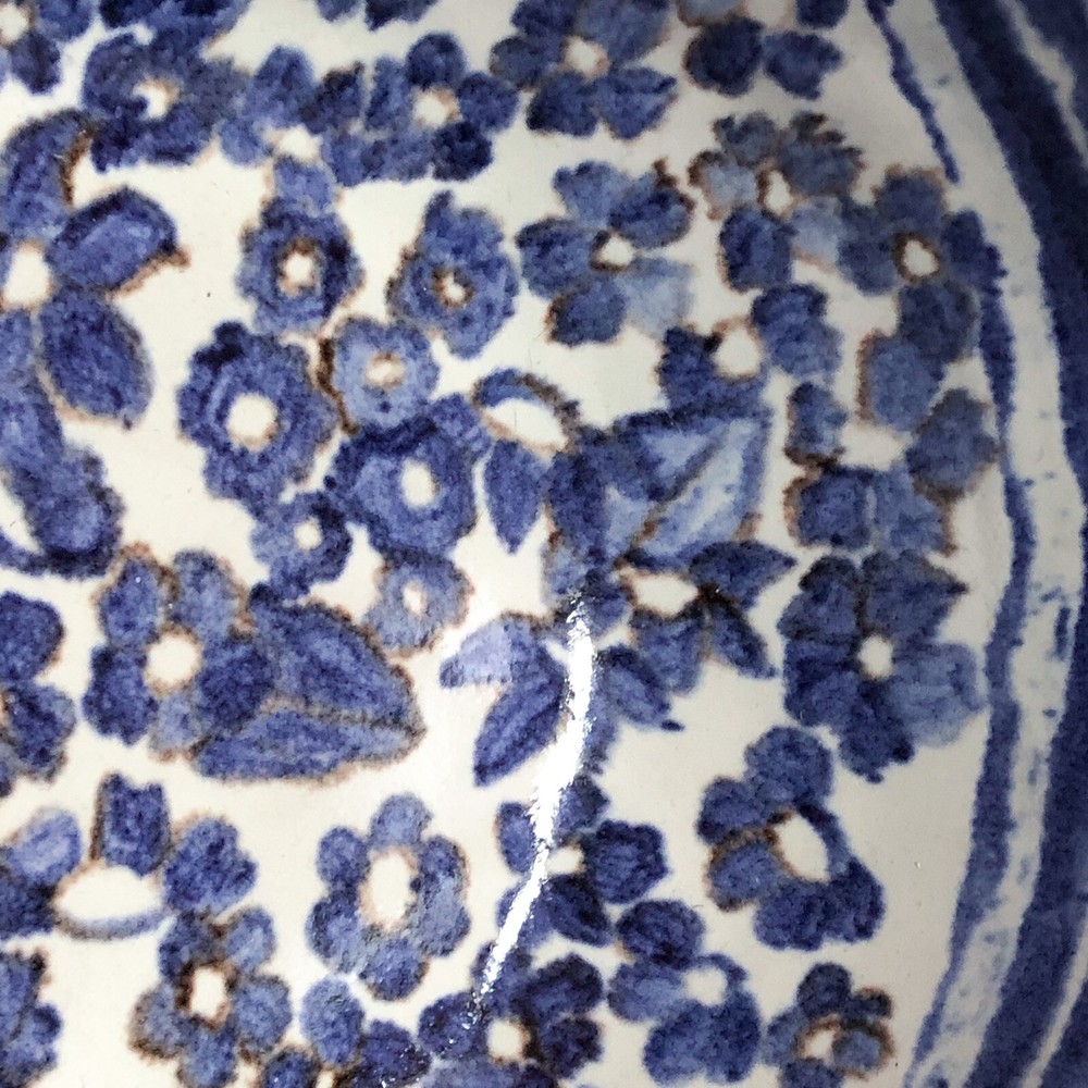 Signed Capuchin style bowl w/ glossy floral interior