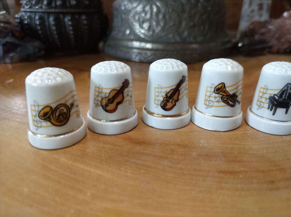 7 vintage ceramic musical instruments thimbles