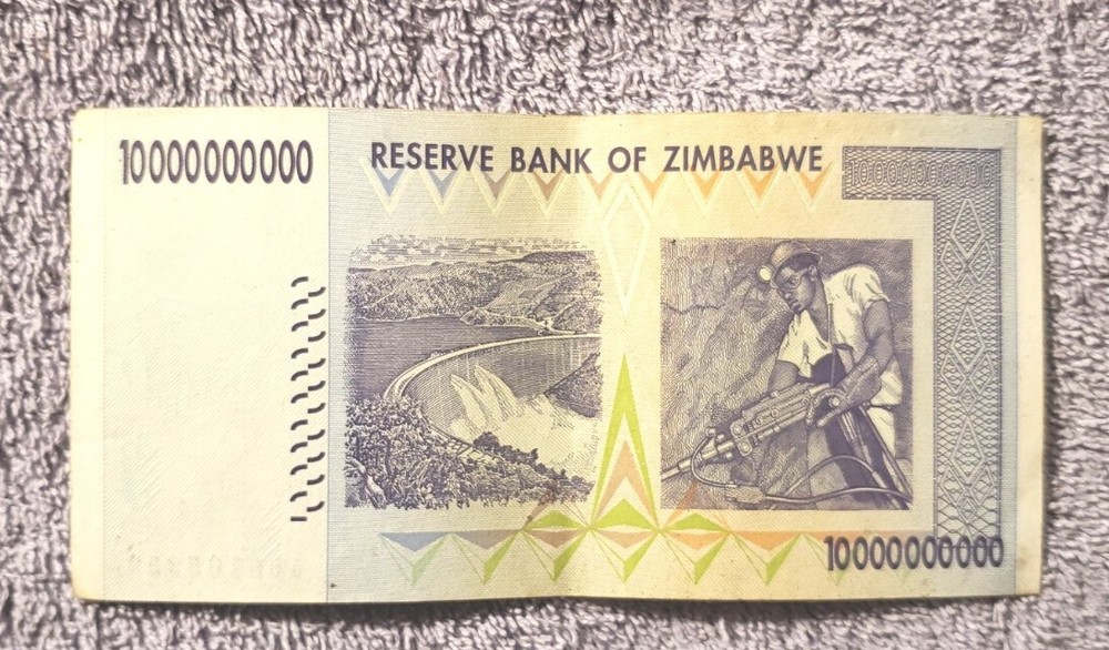 IT. # G-243 / One Zimbabwe $10 BILLION NOTE CIRCULATED CONDITION