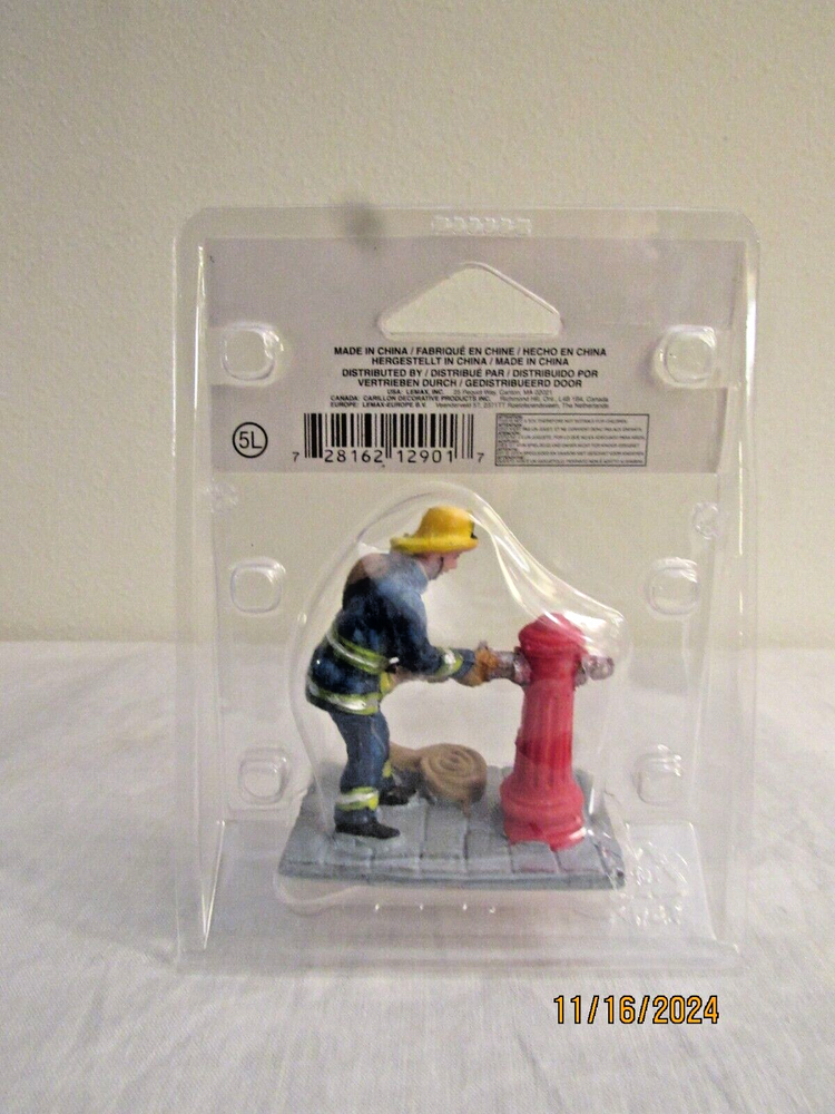 2011 LEMAX FIRFIGHTER FIGURINE #129017281
