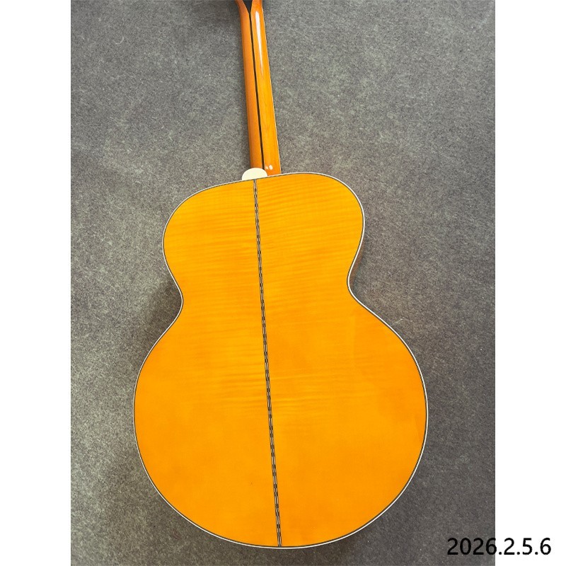Acoustic guitar yellowish Solid spruce board top maple back and side