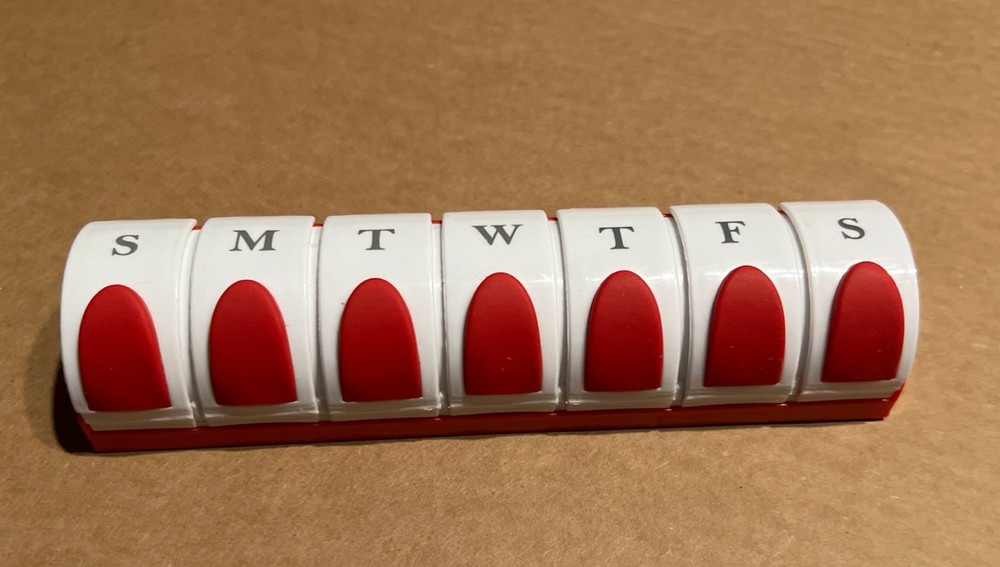 GNC 7 Day Pill Box - 7 Different Compartments - Plastic - Red/White