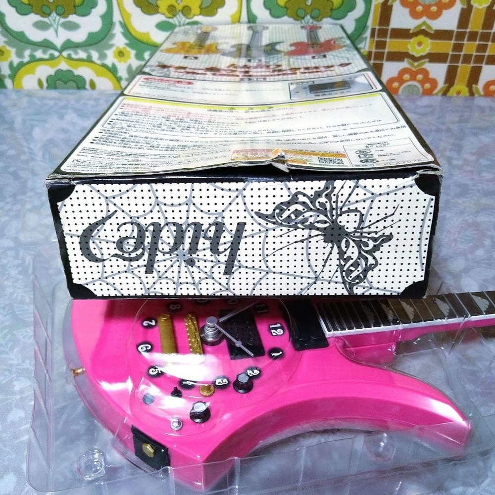 hide guitar wall clock pink