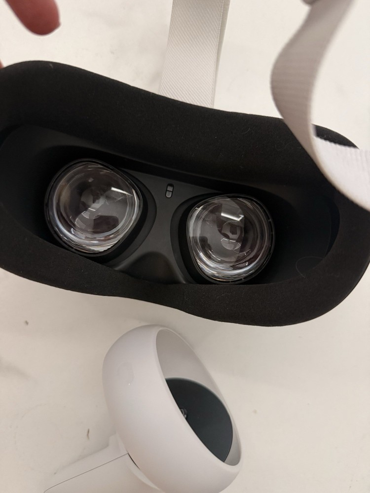 Meta Quest 2 All-In-One VR Headset with its controllers