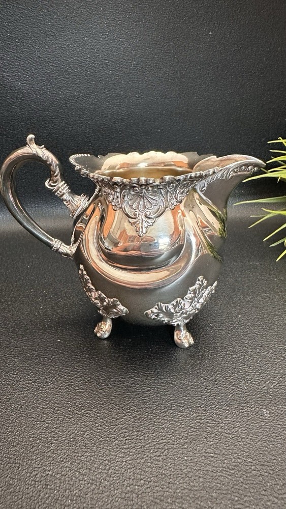 Elegant Silver coated Creamer with Ornate Design