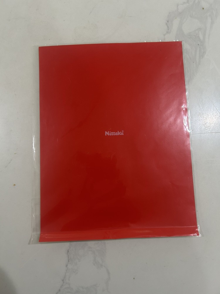 Nittaku Table Tennis Backside Sheet Red color.