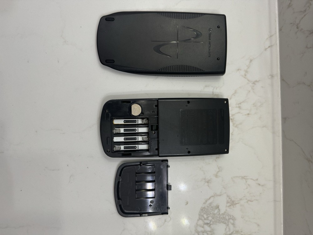 Texas Instruments TI-83 Handheld Graphing Calculator