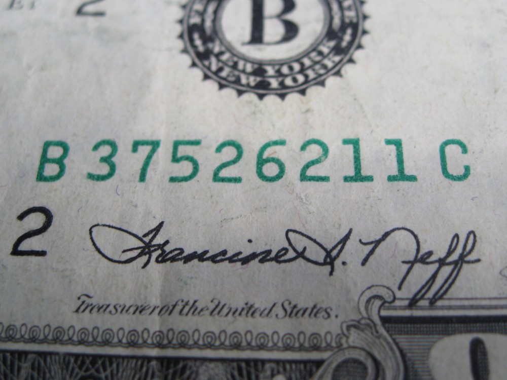 ERROR Note: INK SMEAR. 1974 $1 One Dollar FRN Note. B/C Block.