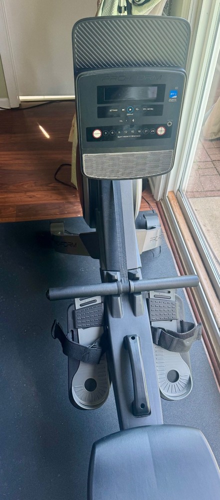 Black Pro form rowing machine opened but used 5 times, good condition