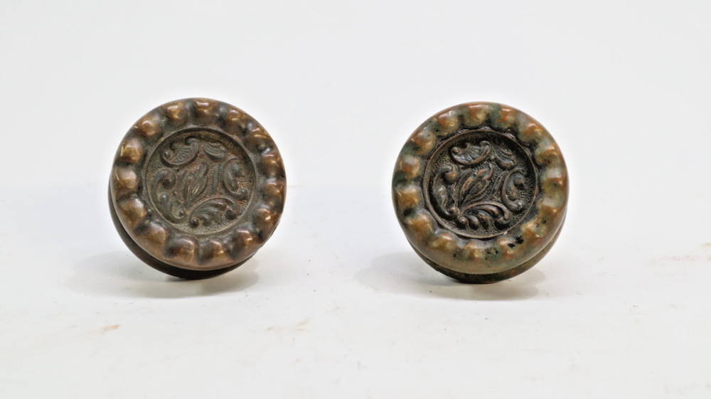 Two "Eulalia" pattern Reading Hardware Company (RHCo) door knobs, antique brass