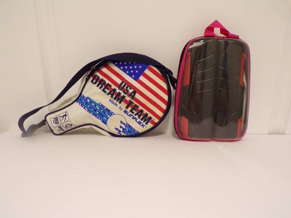 Two double layer table tennis rackets  in a case with net for play