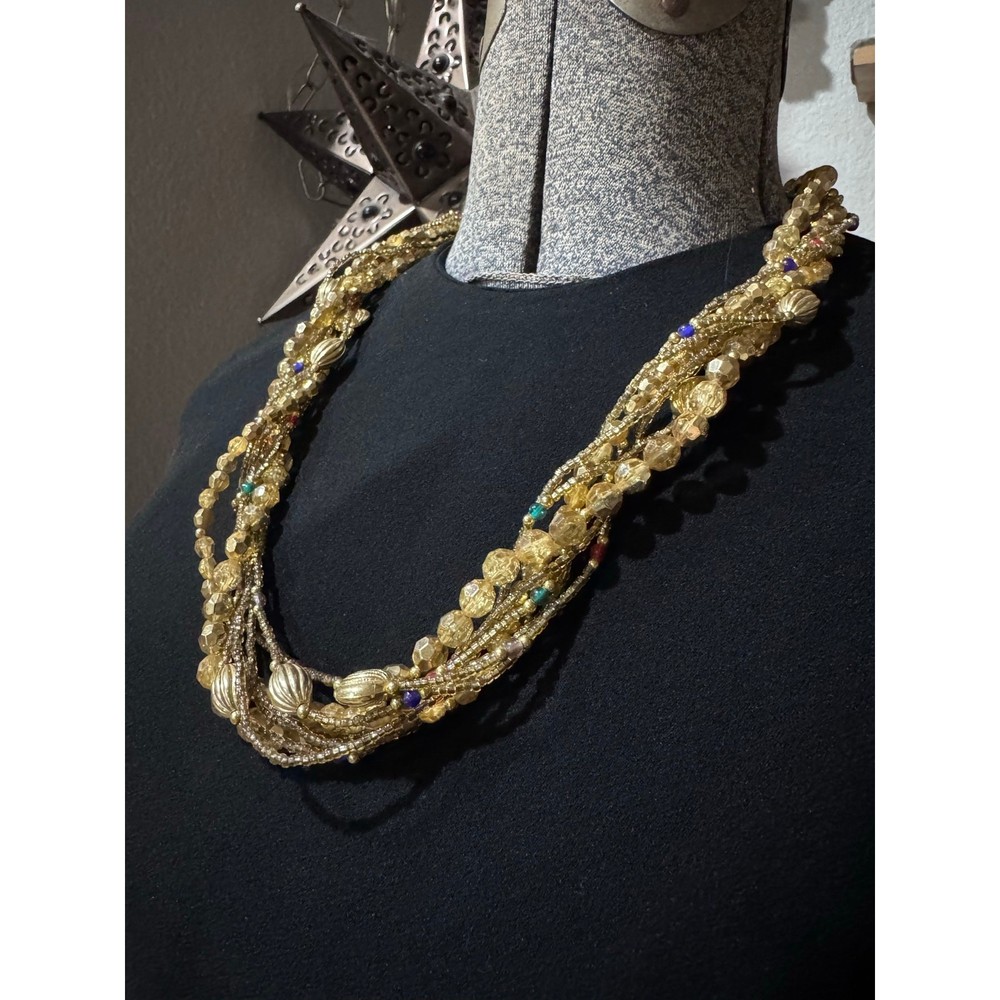 Layered gold statement necklace with major texture and movement