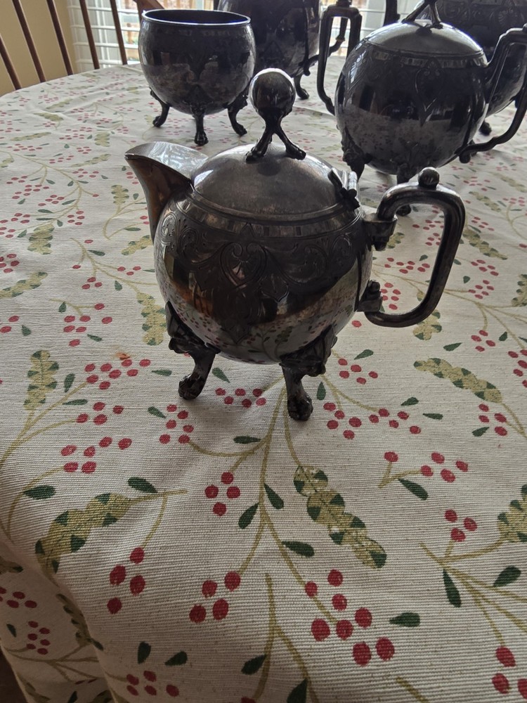 Seven Piece Antique Figural Clawfoot Silver Plate Tea Set