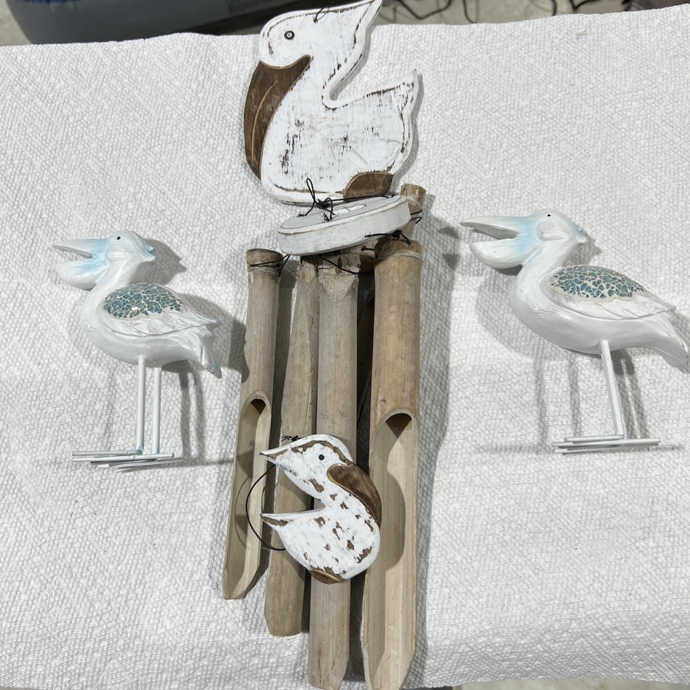Pelican Wind Chimes & Statues