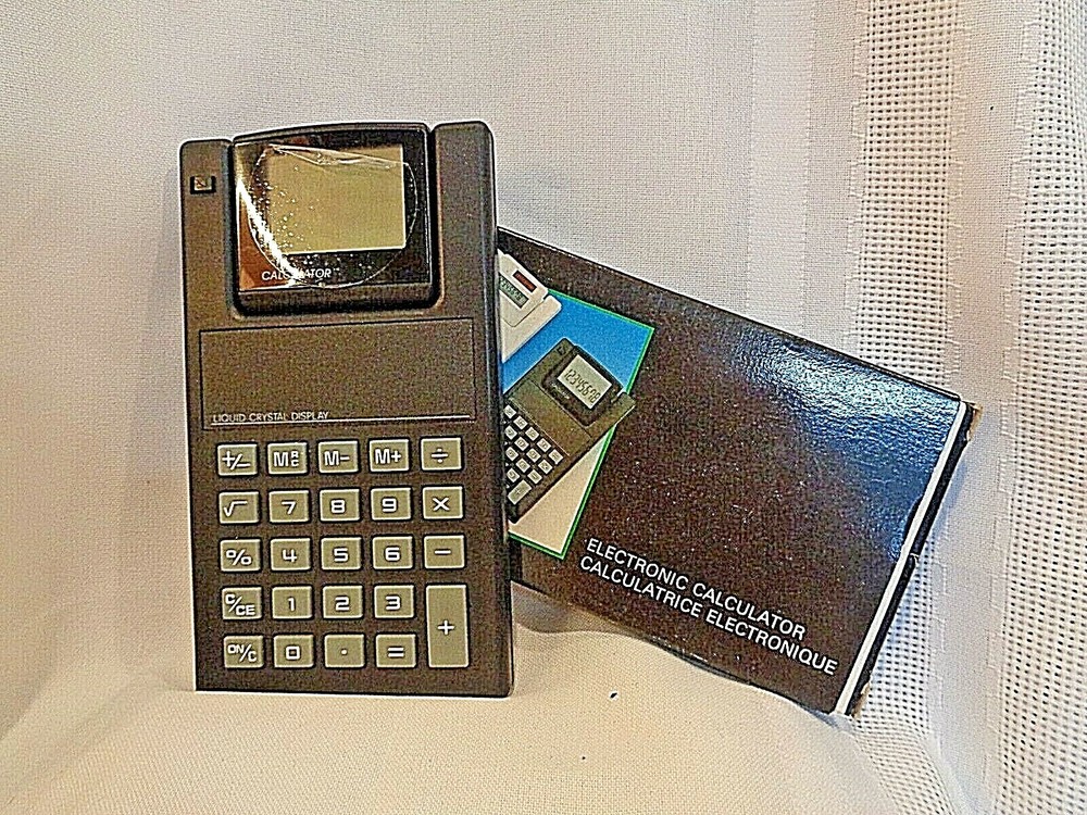 NOS TI ELECTRONIC CALCULATOR  Liquid Crystal Display  Adjustable Screen Black