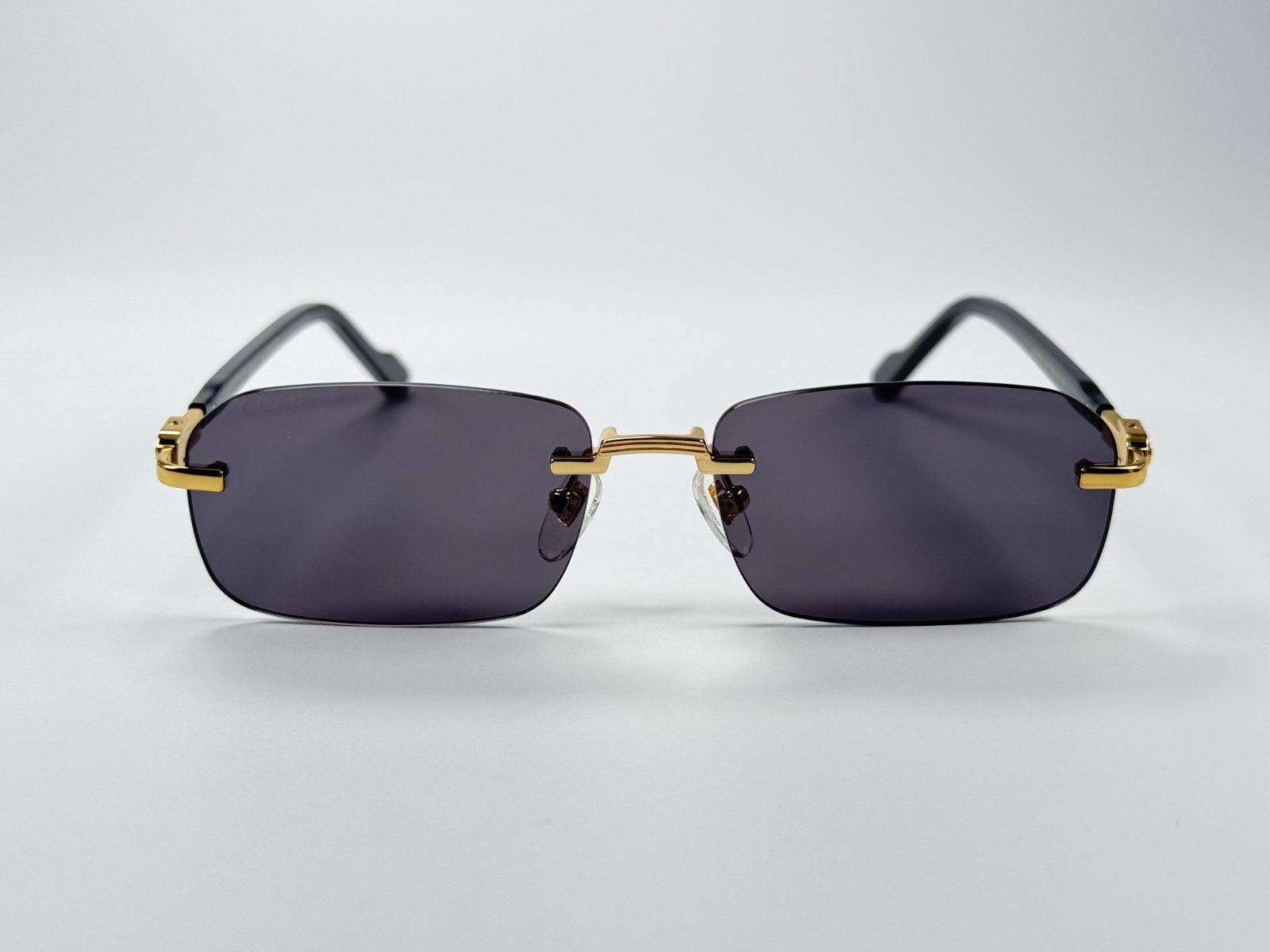 Gucci GG1221S 001 Black Gold Rimless Sunglasses Gray Lens 56mm