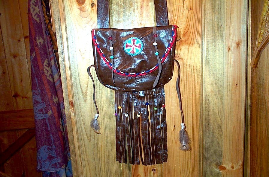 BLACK POWDER, BEAVER TAIL, LEATHER POSSIBLE BAG