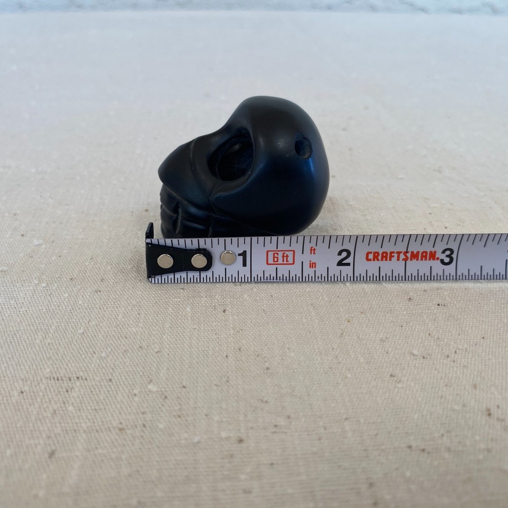 Stylized Carved Stone Skull Pendant