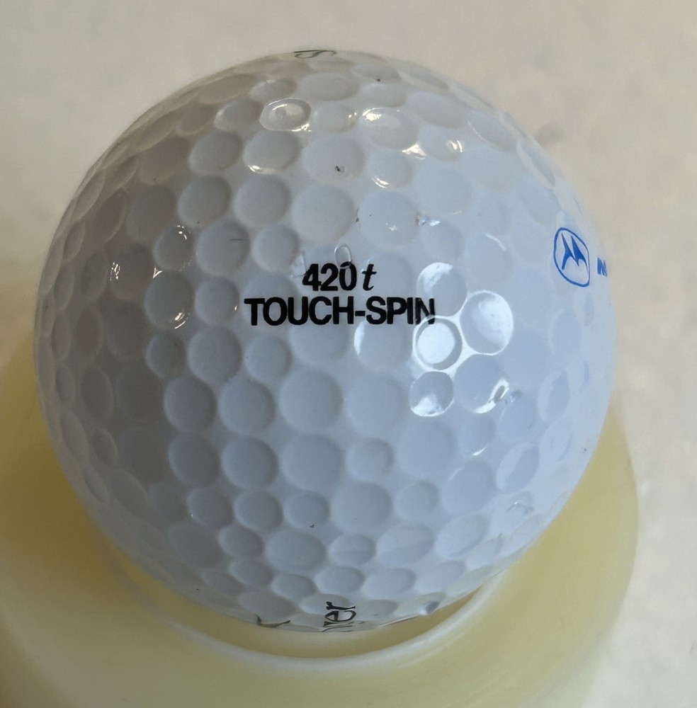 3 Motorola golf balls